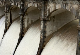 After heavy rains water rushes over the spillway of a dam, Friuli, FriuliÃ¢ÂÂVenezia Giulia, Italy, Europe